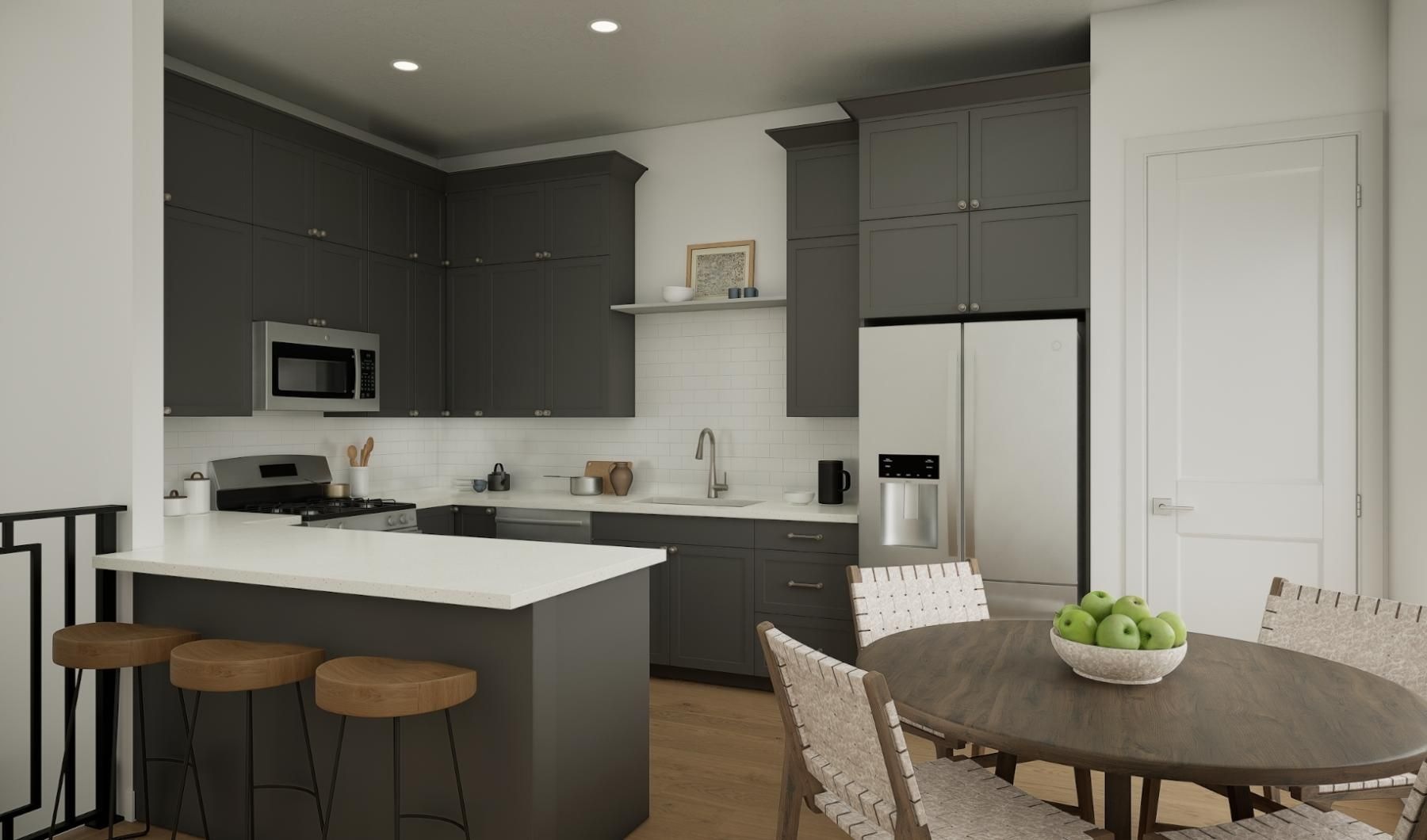 a kitchen with a table and chairs